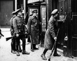 The Dublin Battle Breaking in the doors of a house so as to be able to cut off rebels in the Greshan Hotel. no date given 1916
